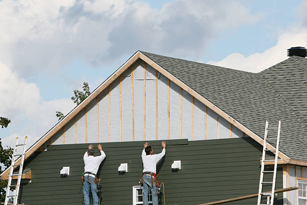 Professional Siding technician working in Auburndale, MA